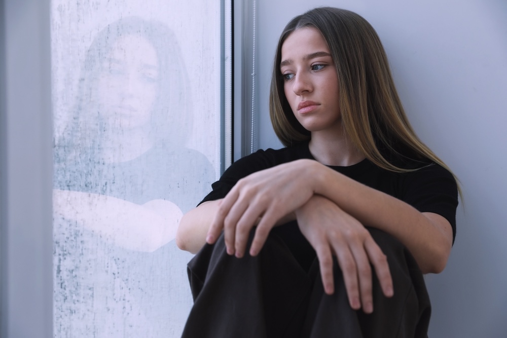 Teen dealing with negative thinking patterns