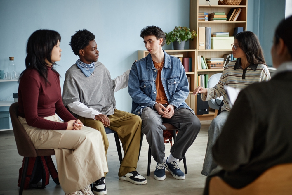 Teens in group therapy for mental health