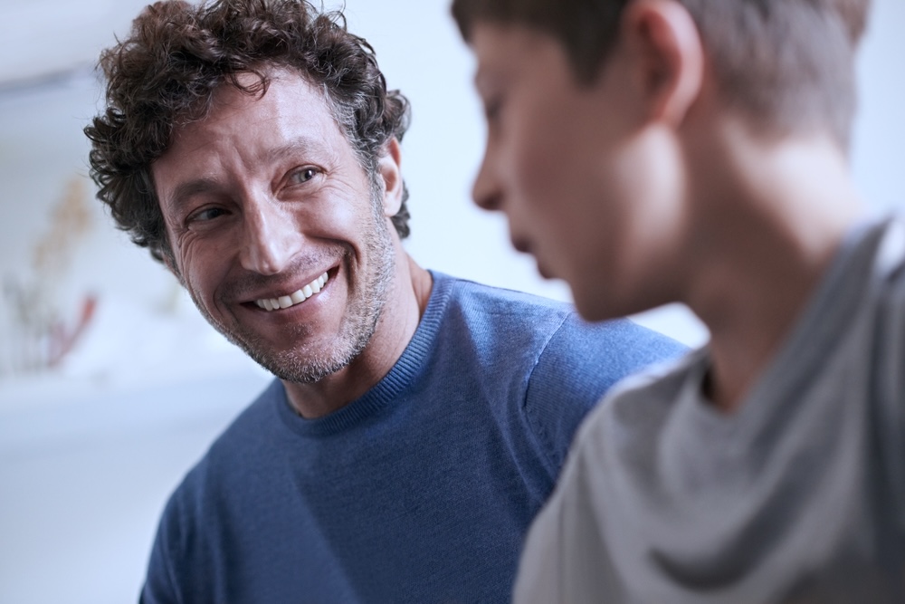 Parent supporting teen after mental health residential treatment